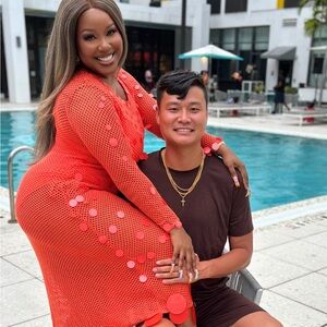 Vibrant Orange Mesh Dress with Circular Accents